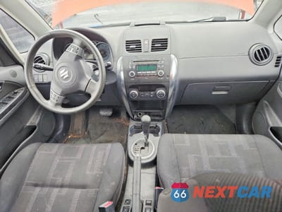 Zdjęcie 8 z 13 samochodu: 2010 SUZUKI SX4 TOURING VIN:JS2YB5A77A6310673 - miniatura