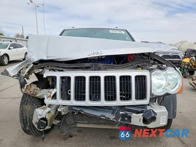 Piąte zdjęcie samochodu w środku: 2010 JEEP GRAND CHEROKEE LAREDO VIN:1J4PR4GK9AC140349 - miniatura