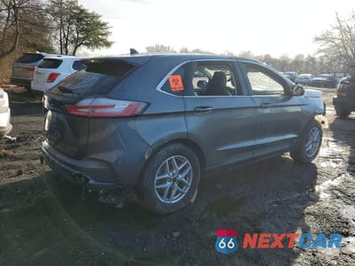 Trzecie zdjęcie samochodu z tyłu: 2024 FORD EDGE VIN:2FMPK4J90RBA78704 - miniatura