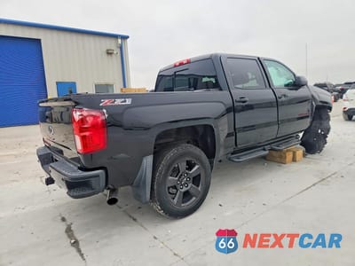 Trzecie zdjęcie samochodu z tyłu: 2017 CHEVROLET SILVERADO K1500 LTZ VIN:3GCUKSEJ4HG411594 - miniatura