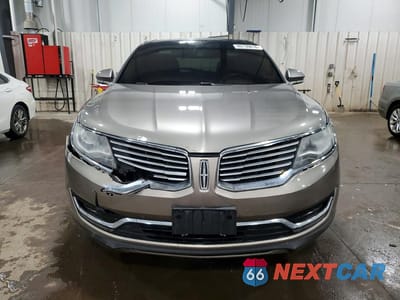 Piąte zdjęcie samochodu w środku: 2016 LINCOLN MKX RESERVE VIN:2LMTJ8LR6GBL51717 - miniatura