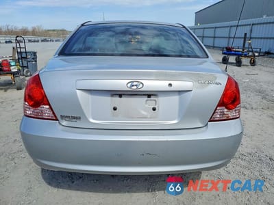 Zdjęcie 6 z 11 samochodu: 2004 HYUNDAI ELANTRA GLS VIN:KMHDN46D24U875000 - miniatura
