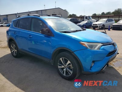 Czwarte zdjęcie samochodu z boku: 2016 TOYOTA RAV4 XLE VIN:JTMWFREV8GD084833 - miniatura