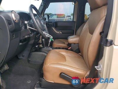 Zdjęcie 7 z 13 samochodu: 2016 JEEP WRANGLER SAHARA VIN:1C4AJWBG9GL285594 - miniatura