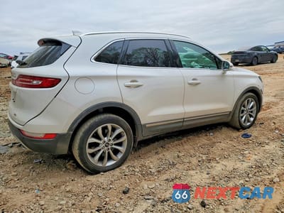 Trzecie zdjęcie samochodu z tyłu: 2018 LINCOLN MKC SELECT VIN:5LMCJ2C94JUL19369 - miniatura