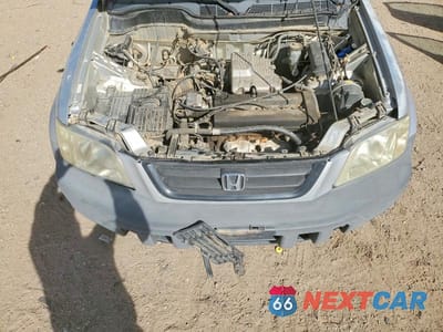 Zdjęcie 11 z 11 samochodu: 1999 HONDA CR-V LX VIN:JHLRD1841XC070790 - miniatura