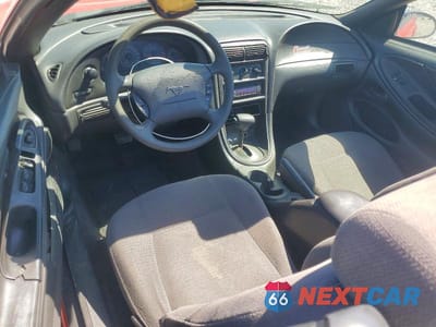 Zdjęcie 8 z 13 samochodu: 2000 FORD MUSTANG VIN:1FAFP4444YF210822 - miniatura