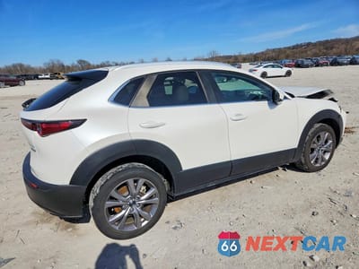 Trzecie zdjęcie samochodu z tyłu: 2022 MAZDA CX-30 PREFERRED VIN:3MVDMBCL2NM424550 - miniatura