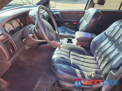 Zdjęcie 7 z 13 samochodu: 2000 JEEP GRAND CHEROKEE LIMITED VIN:1J4GW58N0YC227221 - miniatura