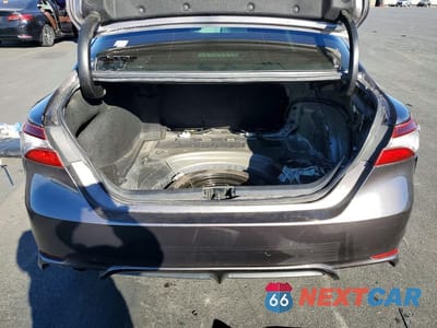 Zdjęcie 6 z 11 samochodu: 2021 TOYOTA CAMRY HYBRID SE VIN:4T1G31AK9MU553008 - miniatura