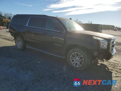 Czwarte zdjęcie samochodu z boku: 2015 GMC YUKON XL K1500 SLT VIN:1GKS2HKC8FR710684 - miniatura