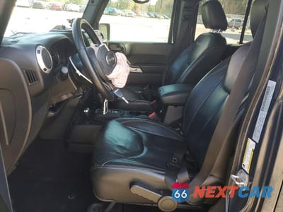 Zdjęcie 7 z 12 samochodu: 2017 JEEP WRANGLER UNLIMITED SAHARA VIN:1C4BJWEG1HL700361 - miniatura