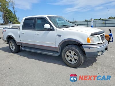 Czwarte zdjęcie samochodu z boku: 2003 FORD F150 SUPERCREW VIN:1FTRW08L03KD86853 - miniatura