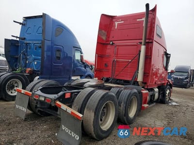 Czwarte zdjęcie samochodu z boku: 2015 VOLVO VN VNL VIN:4V4NC9EH6FN186708 - miniatura