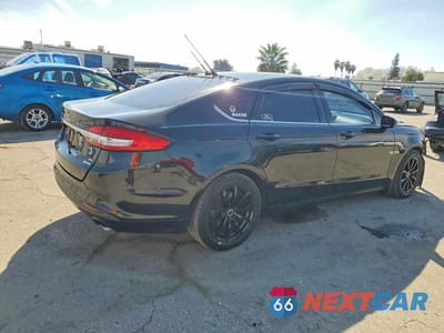 Trzecie zdjęcie samochodu z tyłu: 2018 FORD FUSION SE VIN:3FA6P0HD1JR145343 - miniatura