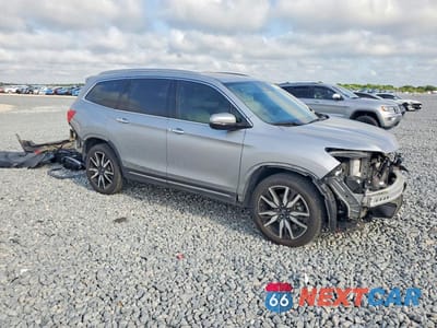 Czwarte zdjęcie samochodu z boku: 2021 HONDA PILOT TOURING VIN:5FNYF6H65MB078729 - miniatura