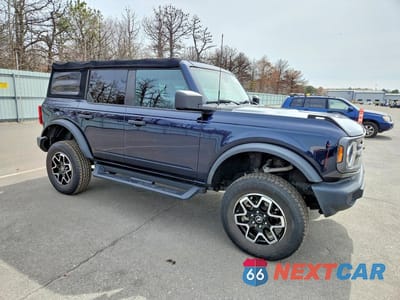 Czwarte zdjęcie samochodu z boku: 2021 FORD BRONCO BASE VIN:1FMDE5BH7MLA84661 - miniatura