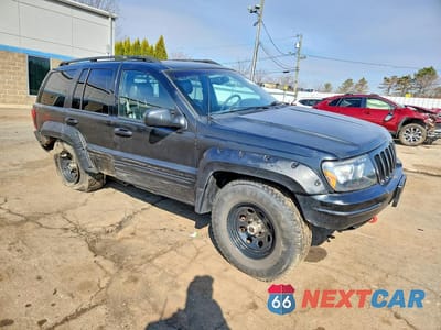 Czwarte zdjęcie samochodu z boku: 2000 JEEP GRAND CHEROKEE LIMITED VIN:1J4GW58N0YC227221 - miniatura