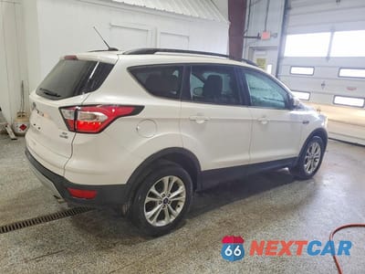 Trzecie zdjęcie samochodu z tyłu: 2017 FORD ESCAPE SE VIN:1FMCU9GD5HUF00850 - miniatura