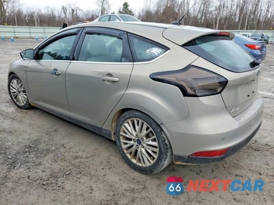 Drugie zdjęcie samochodu z przodu: 2016 FORD FOCUS TITANIUM VIN:1FADP3N2XGL302922 - miniatura