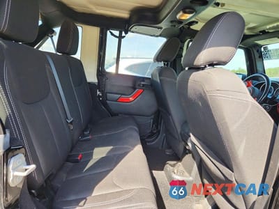 Zdjęcie 10 z 11 samochodu: 2015 JEEP WRANGLER UNLIMITED SAHARA VIN:1C4BJWEG1FL732742 - miniatura