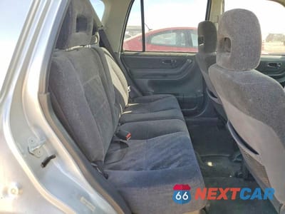 Zdjęcie 10 z 11 samochodu: 1999 HONDA CR-V LX VIN:JHLRD1841XC070790 - miniatura