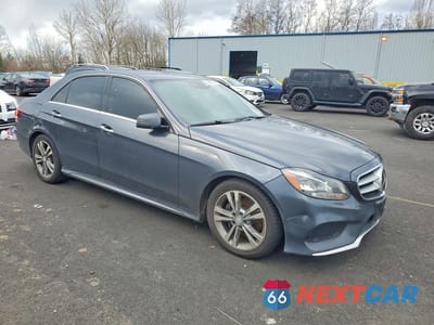 Czwarte zdjęcie samochodu z boku: 2015 MERCEDES-BENZ E 350 4MATIC VIN:WDDHF8JB7FB108120 - miniatura