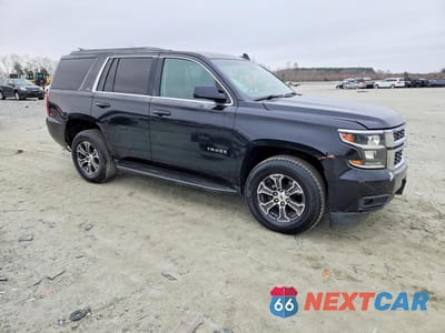Czwarte zdjęcie samochodu z boku: 2015 CHEVROLET TAHOE C1500 LT VIN:1GNSCBKC0FR567100 - miniatura