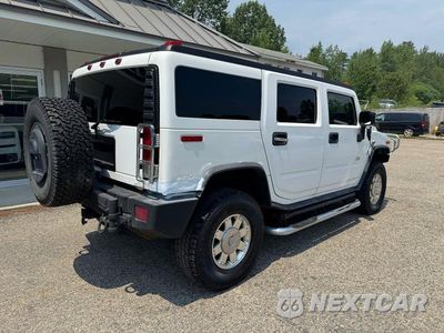 Czwarte zdjęcie samochodu z boku: 2006 HUMMER H2 VIN:5GRGN23U06H106175 - miniatura