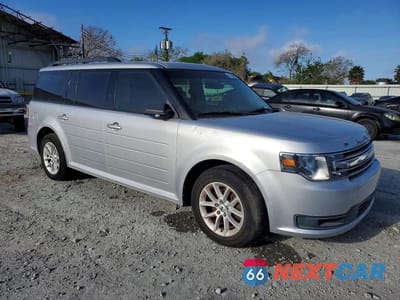 Czwarte zdjęcie samochodu z boku: 2016 FORD FLEX SE VIN:2FMGK5B83GBA06632 - miniatura