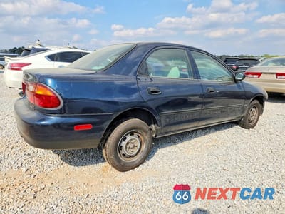 Trzecie zdjęcie samochodu z tyłu: 1996 MAZDA PROTEGE DX VIN:JM1BB1415T0327980 - miniatura