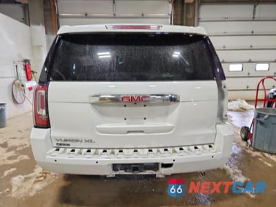 Zdjęcie 6 z 14 samochodu: 2020 GMC YUKON XL DENALI VIN:1GKS2HKJ5LR278839 - miniatura