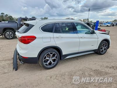 Trzecie zdjęcie samochodu z tyłu: 2017 BMW X1 XDRIVE28I VIN:WBXHT3C36H5F83633 - miniatura