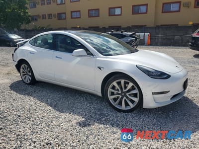Czwarte zdjęcie samochodu z boku: 2019 TESLA MODEL 3 VIN:5YJ3E1EB9KF481532 - miniatura