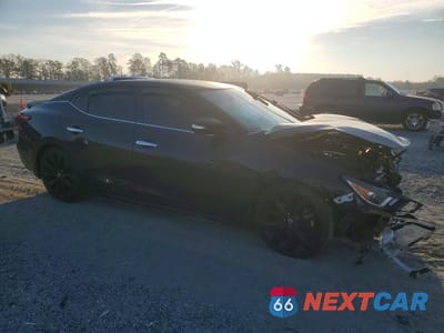 Czwarte zdjęcie samochodu z boku: 2017 NISSAN MAXIMA 3.5 SR VIN:1N4AA6AP4HC427228 - miniatura