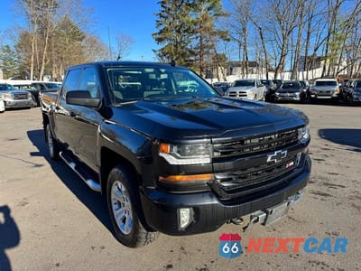 Czwarte zdjęcie samochodu z boku: 2018 CHEVROLET SILVERADO K1500 LT VIN:3GCUKREC1JG377226 - miniatura