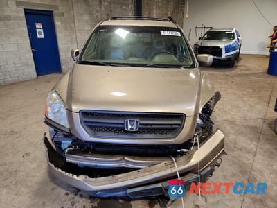 Piąte zdjęcie samochodu w środku: 2004 HONDA PILOT EXL VIN:2HKYF185X4H525857 - miniatura