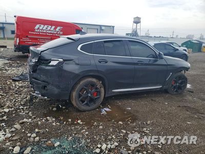 Trzecie zdjęcie samochodu z tyłu: 2021 BMW X4 XDRIVE30I VIN:5UX2V1C04M9F54334 - miniatura