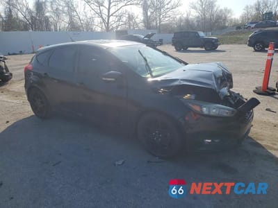 Czwarte zdjęcie samochodu z boku: 2015 FORD FOCUS SE VIN:1FADP3K22FL255422 - miniatura