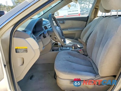 Zdjęcie 7 z 12 samochodu: 2006 KIA OPTIMA LX VIN:KNAGE123465067190 - miniatura