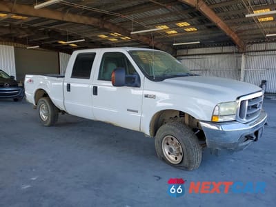 Czwarte zdjęcie samochodu z boku: 2004 FORD F250 SUPER DUTY VIN:1FTNW21P74EB80789 - miniatura