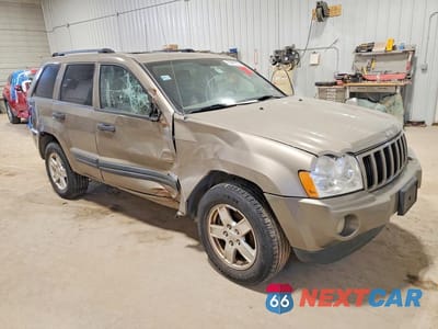 Czwarte zdjęcie samochodu z boku: 2005 JEEP GRAND CHEROKEE LAREDO VIN:1J4HS48N05C536760 - miniatura
