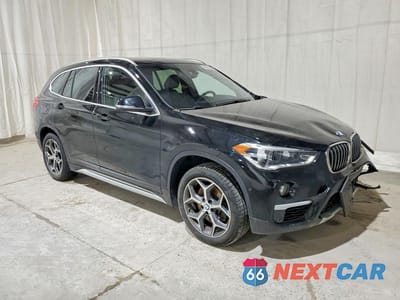 Czwarte zdjęcie samochodu z boku: 2018 BMW X1 XDRIVE28I VIN:WBXHT3C36J5L29584 - miniatura