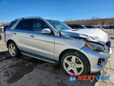 Czwarte zdjęcie samochodu z boku: 2015 MERCEDES-BENZ ML 350 4MATIC VIN:4JGDA5HB7FA586311 - miniatura