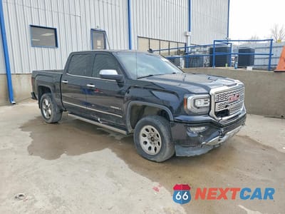 Czwarte zdjęcie samochodu z boku: 2017 GMC SIERRA K1500 DENALI VIN:3GTU2PEJ2HG310955 - miniatura