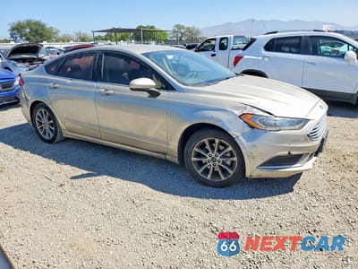 Czwarte zdjęcie samochodu z boku: 2017 FORD FUSION SE VIN:3FA6P0HDXHR293565 - miniatura