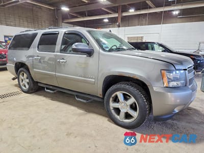 Czwarte zdjęcie samochodu z boku: 2012 CHEVROLET SUBURBAN K1500 LTZ VIN:1GNSKKE70CR193892 - miniatura