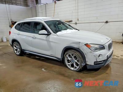 Czwarte zdjęcie samochodu z boku: 2014 BMW X1 XDRIVE35I VIN:WBAVM5C53EVV92483 - miniatura