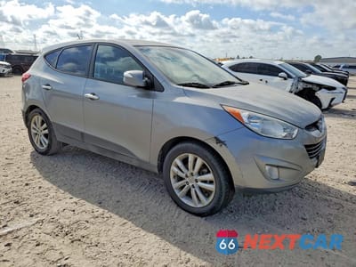 Czwarte zdjęcie samochodu z boku: 2013 HYUNDAI TUCSON LIMITED VIN:KM8JU3AC1DU603620 - miniatura