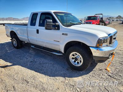 Czwarte zdjęcie samochodu z boku: 2002 FORD F350 SRW SUPER DUTY VIN:1FTSX31F72EB12518 - miniatura